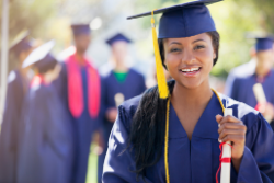 Graduating student holding a diploma